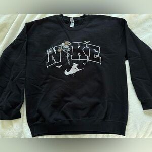 “Nike” Halloween pullover. Size larger. Worn a couple times. Purchased on Etsy